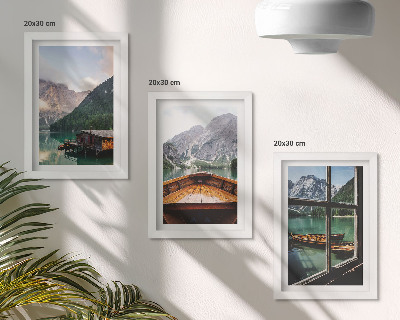 Mur de cadres Lac de montagne avec un bateau et des maisons en bois