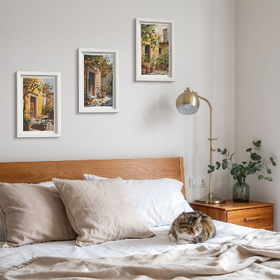 Ensemble de 3 tableaux Agrumes dans une cour ensoleillée avec des plantes