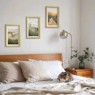 Ensemble de 3 tableaux paysage représentant une prairie avec une route et un coucher de soleil