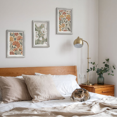 Mur de cadres Motifs floraux dans les tons orange et vert