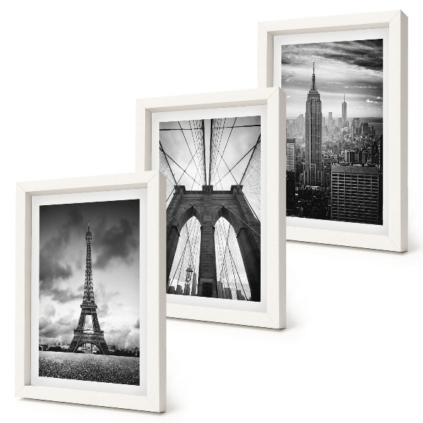Mur de cadres Tours et ponts aux teintes monochromes