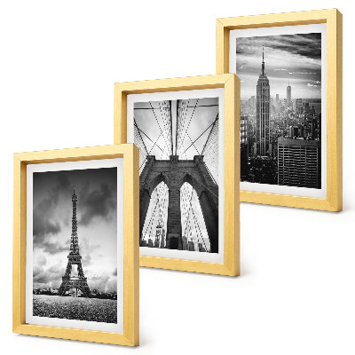 Mur de cadres Tours et ponts aux teintes monochromes