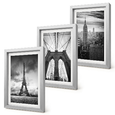 Mur de cadres Tours et ponts aux teintes monochromes