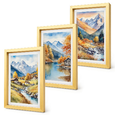 Lot de 3 tableaux Montagnes aux couleurs automnales, traversées par une rivière et parsemées de chalets.