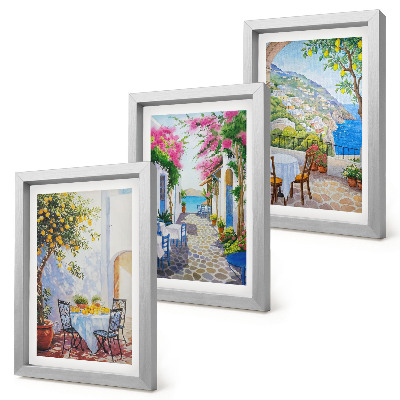 Mur de cadres Rues charmantes bordées de plantes fleuries et offrant une vue sur la mer