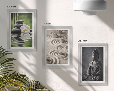 Mur de cadres Vue apaisante sur un Bouddha, des galets sur la plage et des bambous.