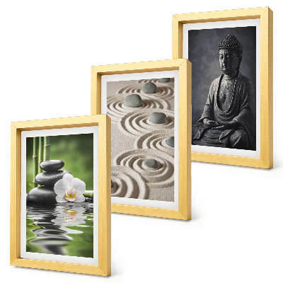 Mur de cadres Vue apaisante sur un Bouddha, des galets sur la plage et des bambous.