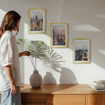 Lot de 3 tableaux Vues nocturnes de la ville avec ses gratte-ciel et ses lumières