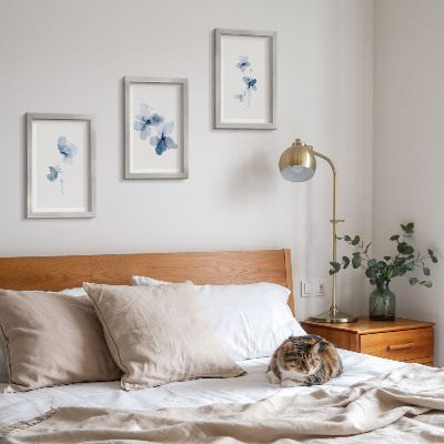 Lot de 3 tableaux Fleurs dans des tons de bleu sur fond clair
