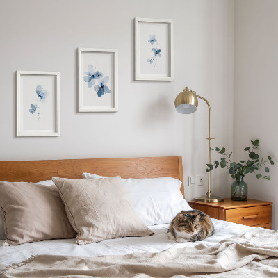 Lot de 3 tableaux Fleurs dans des tons de bleu sur fond clair