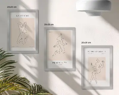 Mur de cadres avec affiches minimalistes représentant des silhouettes linéaires de femmes