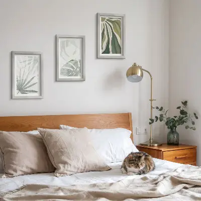 Ensemble de 3 tableaux représentant des feuilles de plantes dans des tons de vert et de gris