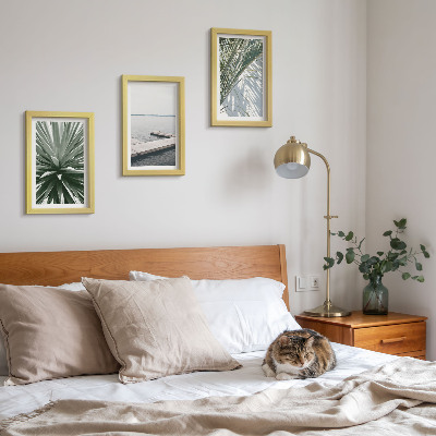 Ensemble de 3 tableaux Plante à feuilles de palmier et jetée en bois