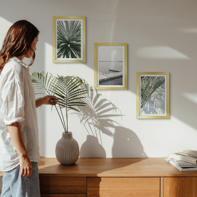 Ensemble de 3 tableaux Plante à feuilles de palmier et jetée en bois