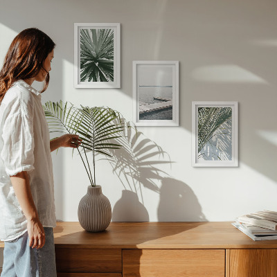 Ensemble de 3 tableaux Plante à feuilles de palmier et jetée en bois