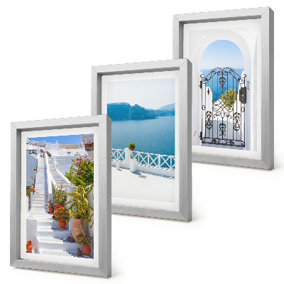 Mur de cadres Escalier blanc avec plantes, vue sur la mer et portail