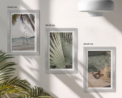 Mur de cadres Vacances à la plage sur une balançoire en feuille de palmier