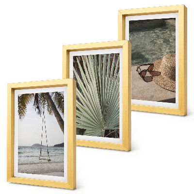 Mur de cadres Vacances à la plage sur une balançoire en feuille de palmier