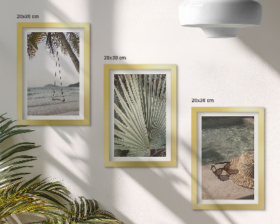 Mur de cadres Vacances à la plage sur une balançoire en feuille de palmier