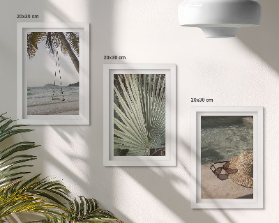 Mur de cadres Vacances à la plage sur une balançoire en feuille de palmier