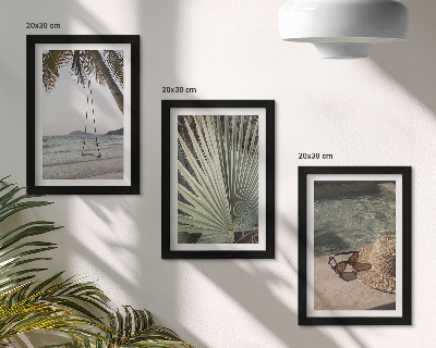 Mur de cadres Vacances à la plage sur une balançoire en feuille de palmier