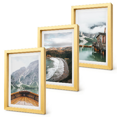Mur de cadres Vue des montagnes sur le lac avec un bateau et un paysage de plage