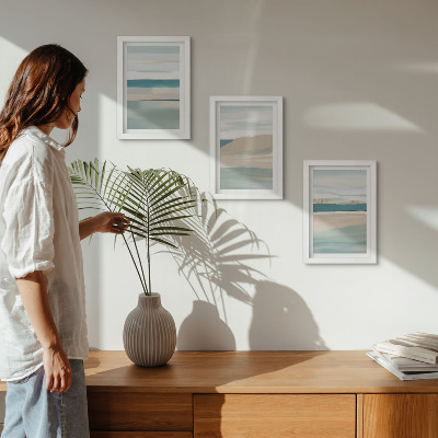 Mur de cadres Paysages abstraits dans des tons de bleu et de beige