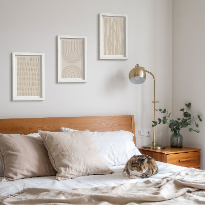 Mur de cadres Motifs abstraits dans les tons beige et blanc