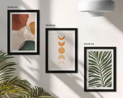 Mur de cadres avec motifs de formes abstraites aux couleurs chaudes et feuilles