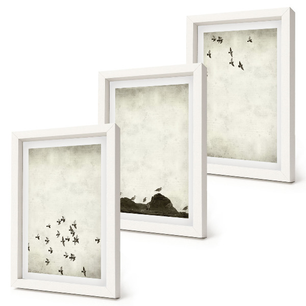 Mur de cadres Oiseaux en vol peints dans un style minimaliste