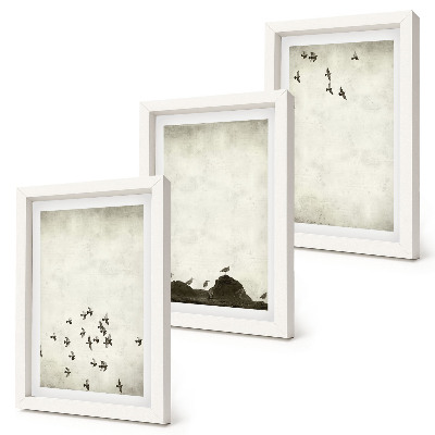 Mur de cadres Oiseaux en vol peints dans un style minimaliste
