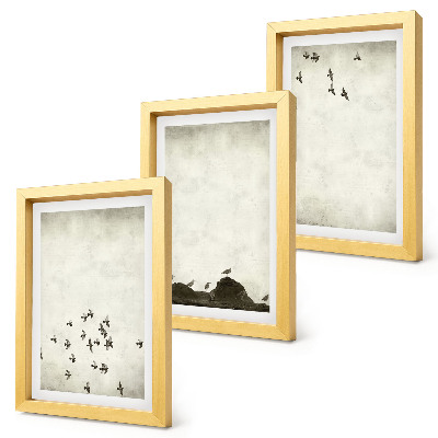 Mur de cadres Oiseaux en vol peints dans un style minimaliste