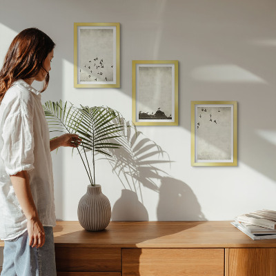 Mur de cadres Oiseaux en vol peints dans un style minimaliste