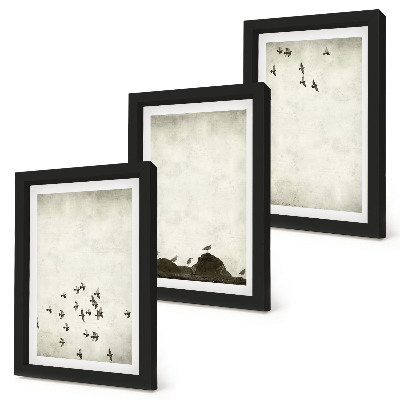 Mur de cadres Oiseaux en vol peints dans un style minimaliste