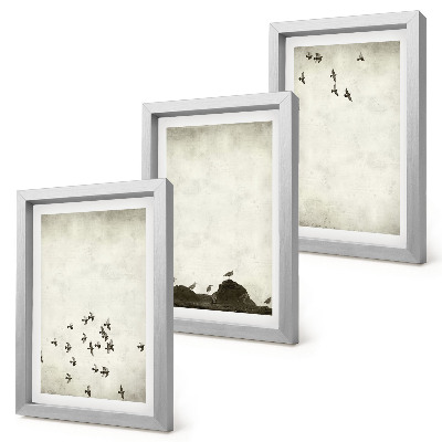 Mur de cadres Oiseaux en vol peints dans un style minimaliste
