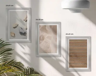 Mur de cadres composition en pierres, bois, tissu et textures variées