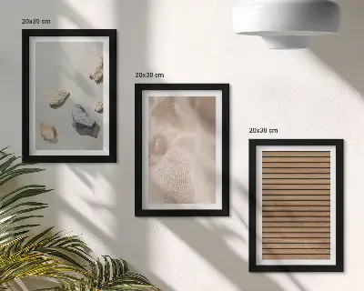 Mur de cadres composition en pierres, bois, tissu et textures variées