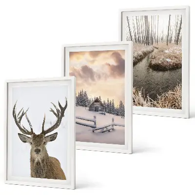 Cadre photo mural représentant une cabane à cerfs dans un paysage d'hiver