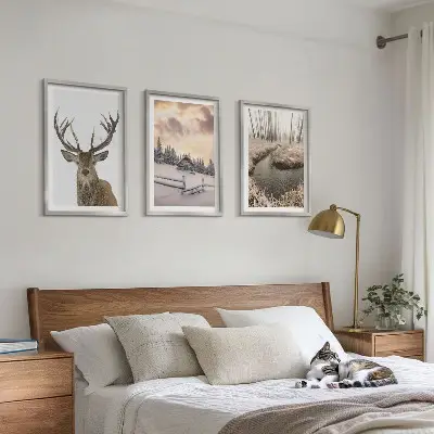 Cadre photo mural représentant une cabane à cerfs dans un paysage d'hiver