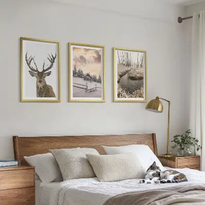 Cadre photo mural représentant une cabane à cerfs dans un paysage d'hiver