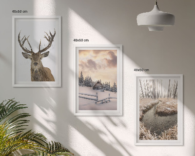 Cadre photo mural Cabane à cerfs dans un paysage d'hiver