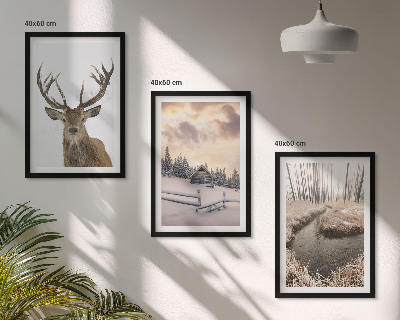 Cadre photo mural Cabane à cerfs dans un paysage d'hiver
