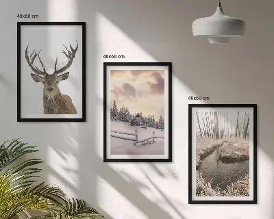 Cadre photo mural représentant une cabane à cerfs dans un paysage d'hiver