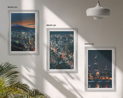 Cadre photo mural Vue de la ville sur la montagne la nuit