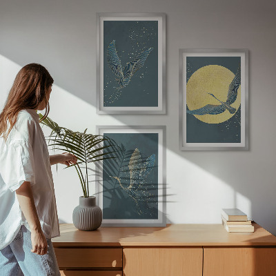 Cadre photo mural Grues en vol la nuit