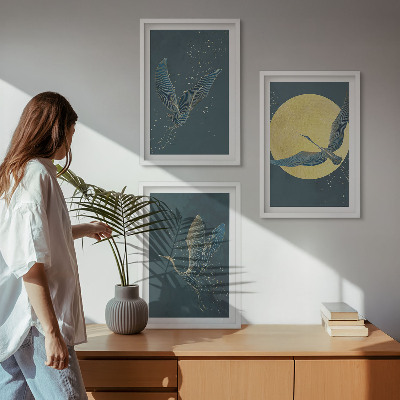 Cadre photo mural Grues en vol la nuit