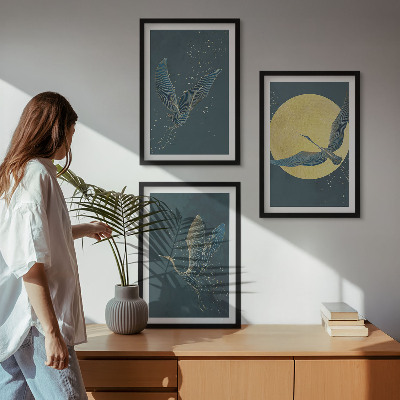 Cadre photo mural Grues en vol la nuit
