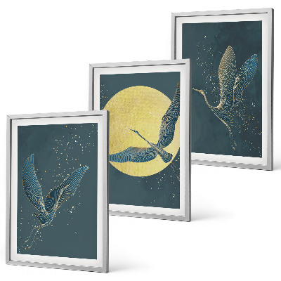Cadre photo mural Grues en vol la nuit