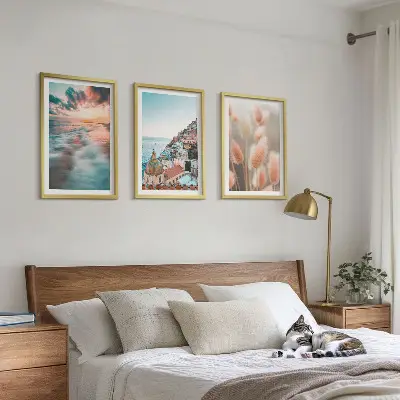 Lot de 3 tableaux pour salon représentant un coucher de soleil sur la mer avec des maisons et des fleurs