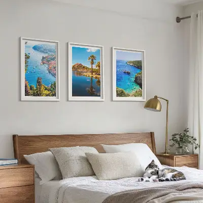 Cadre photo mural palmiers en bord de mer avec eau bleue